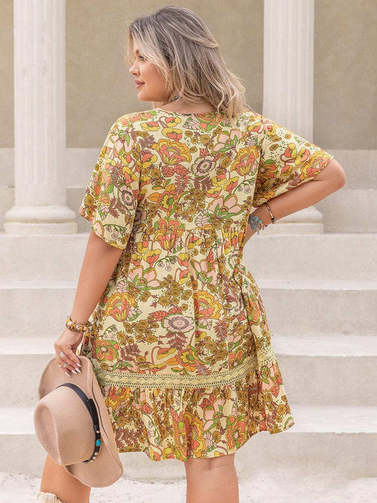 Plus Size Printed Tie Neck Short Sleeve Mini Dress - Trendsi - Flyclothing LLC