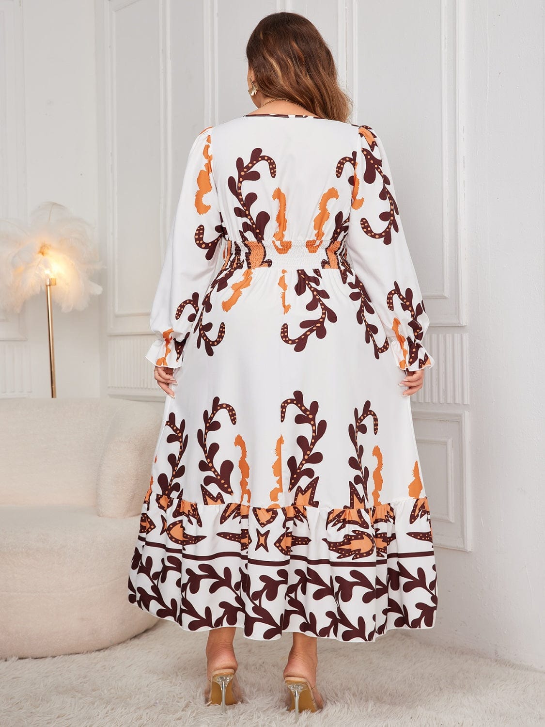 Plus Size Printed Surplice Flounce Sleeve Dress - Trendsi