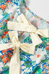 Floral Print Bow Applique Slit Sleeveless Peplum Blouse - Trendsi - Flyclothing LLC