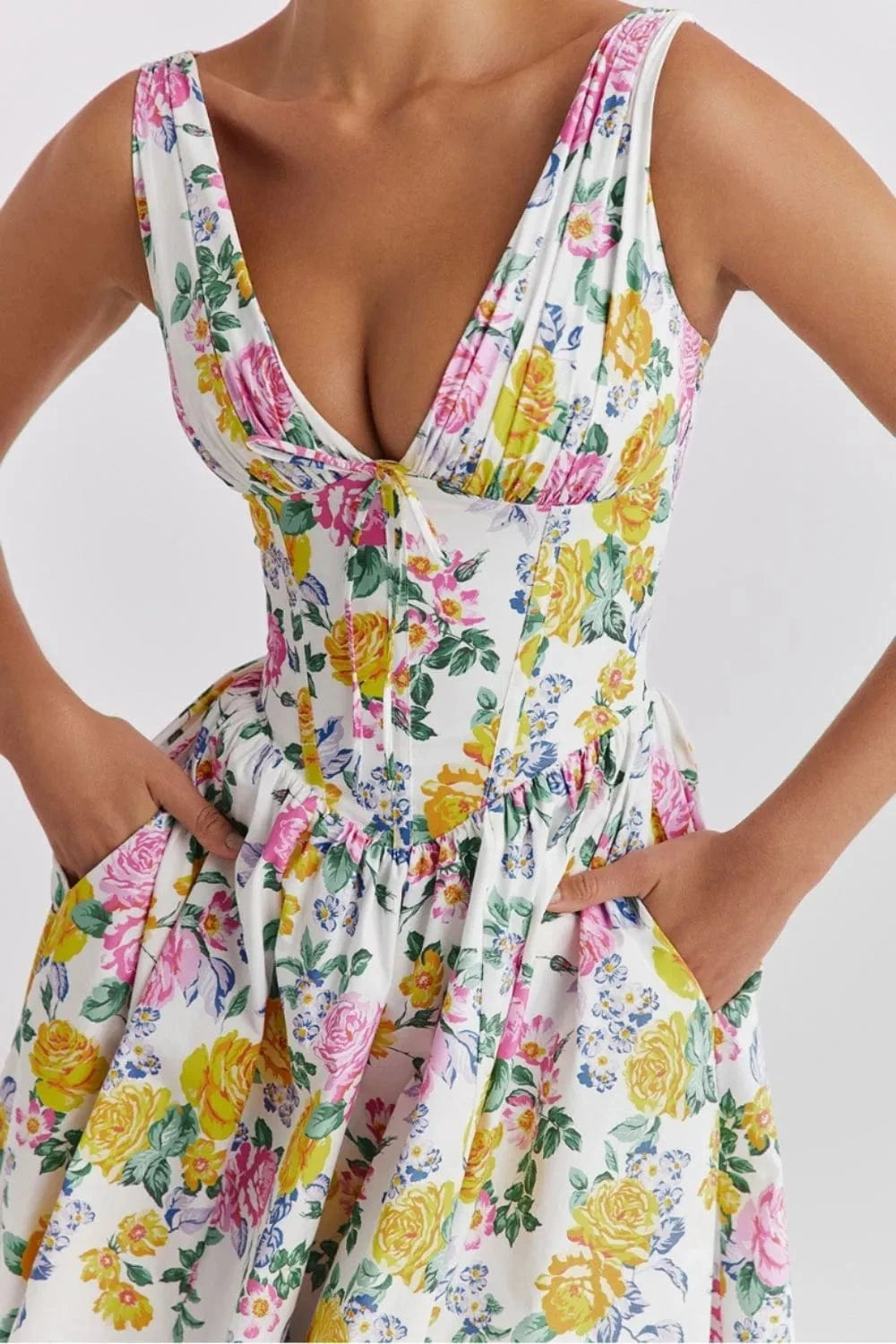 Floral V-Neck Sleeveless Midi Dress with Pockets - Trendsi
