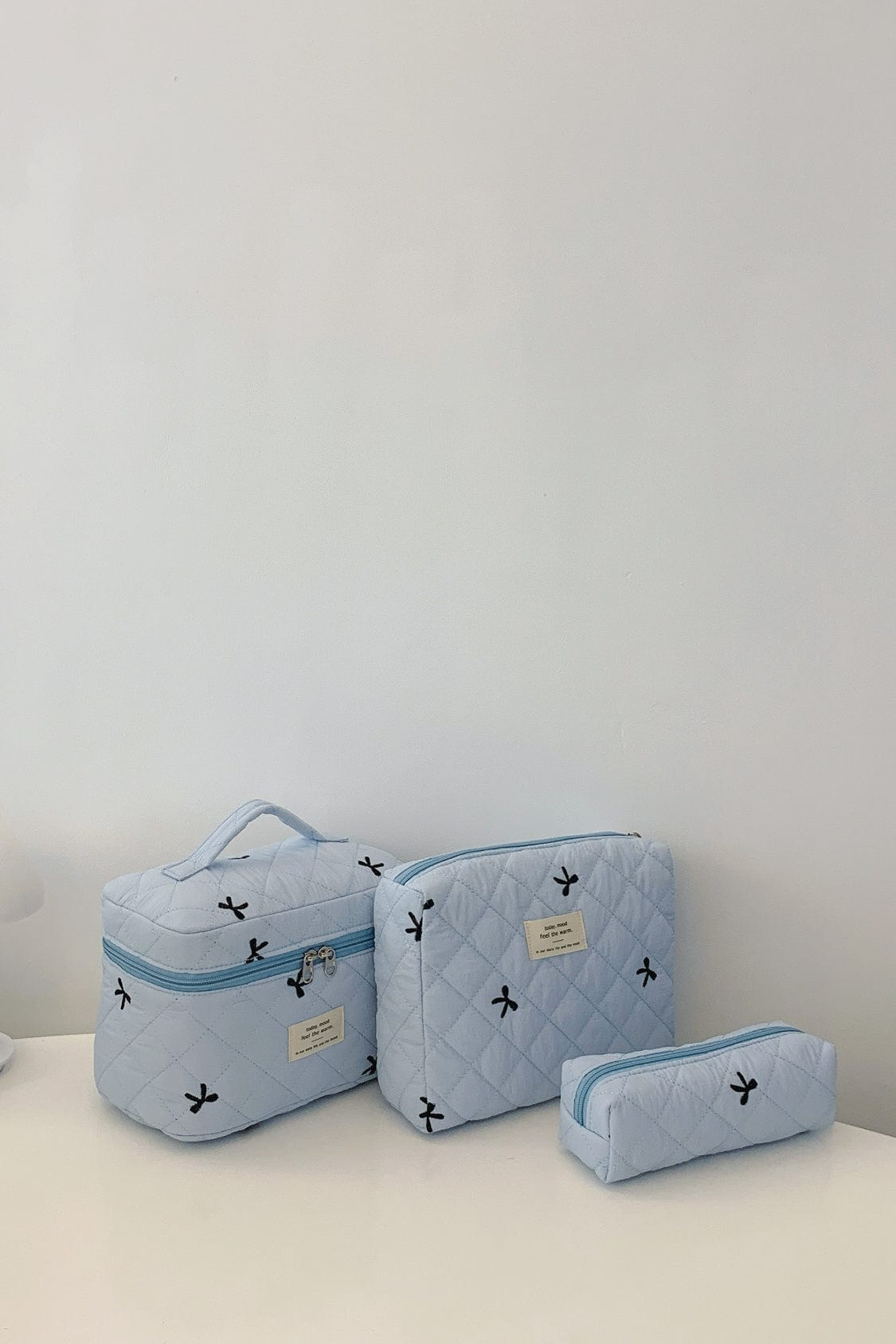 3 Piece Bow Quilted Cloth Storage Bag Set - Trendsi