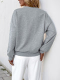 Perfee Cutout Pearl Round Neck Long Sleeve Sweatshirt - Trendsi