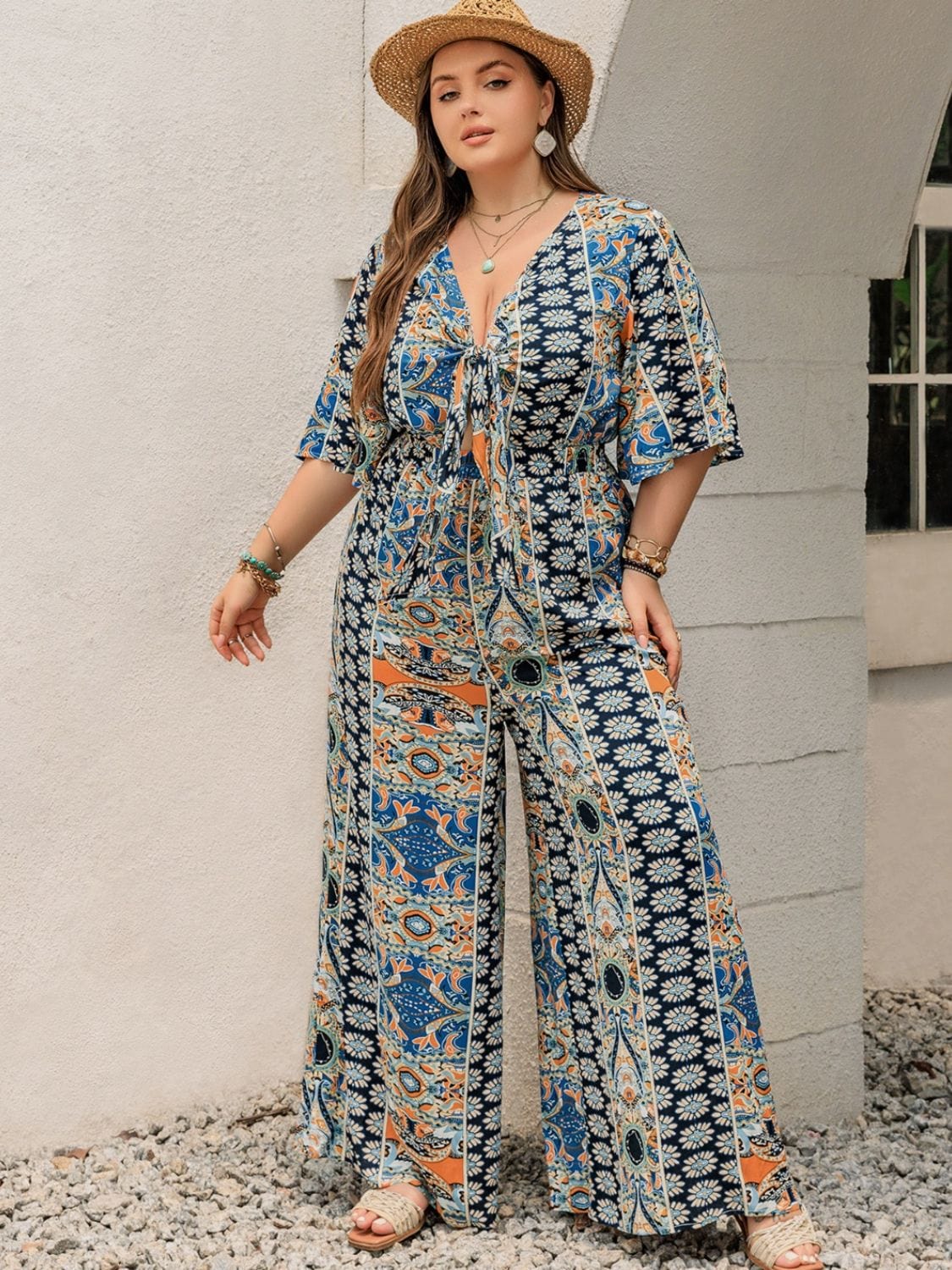 Plus Size Printed Half Sleeve Wide Leg Jumpsuit - Trendsi