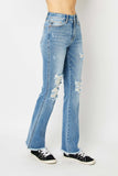 Judy Blue Full Size Distressed Raw Hem Bootcut Jeans - Trendsi