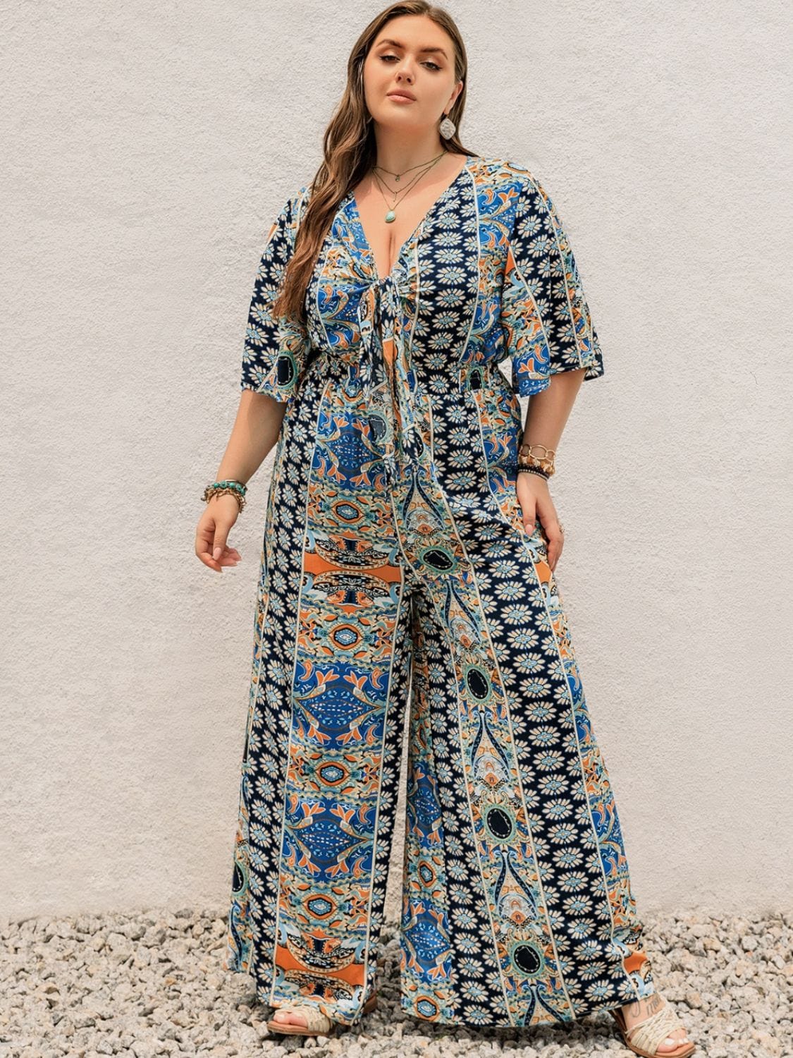 Plus Size Printed Half Sleeve Wide Leg Jumpsuit - Trendsi