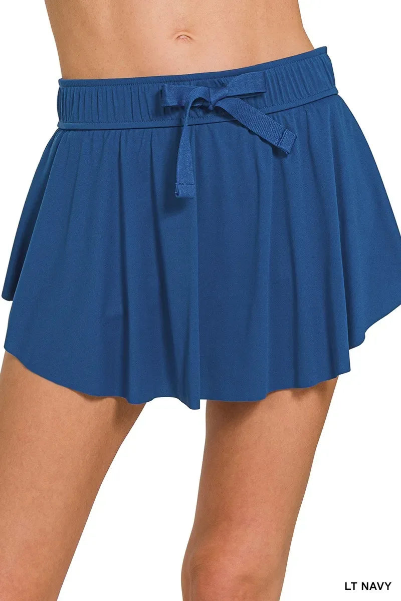 Zenana Ruffle Hem Tennis Skirt With Hidden Inner Pockets - Trendsi - Flyclothing LLC