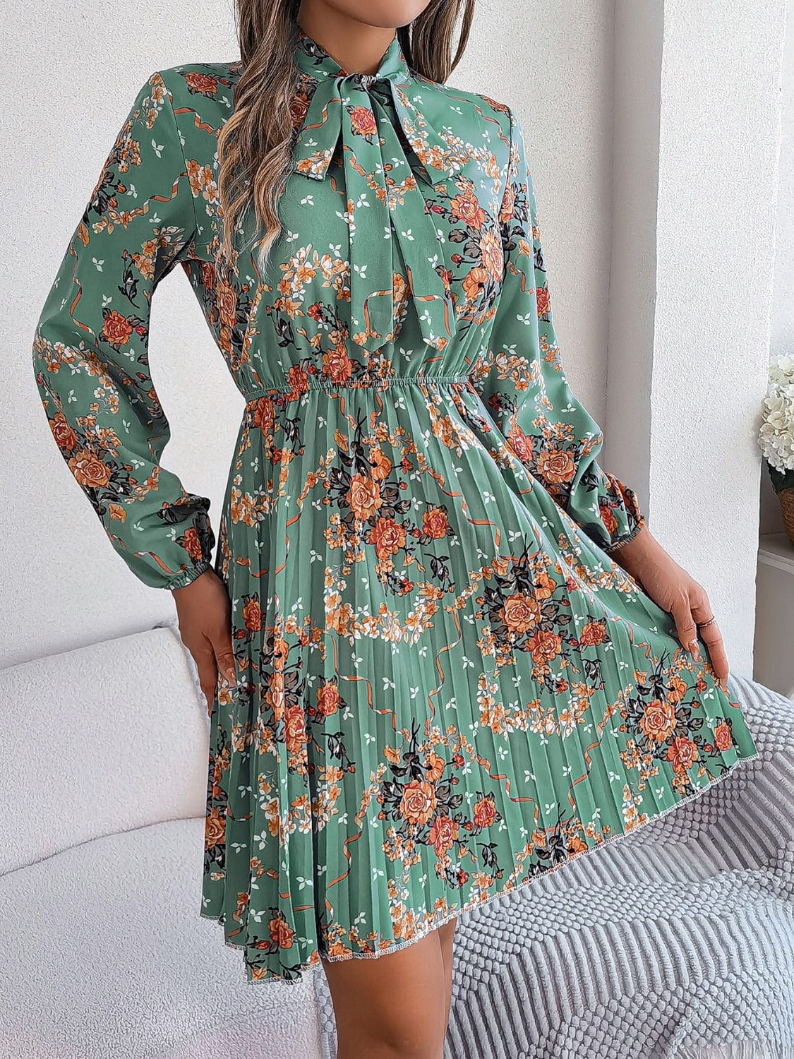 Pleated Printed Tie Neck Long Sleeve Dress - Trendsi