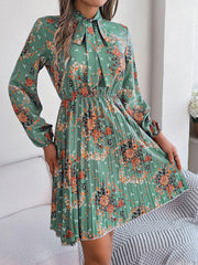 Pleated Printed Tie Neck Long Sleeve Dress - Trendsi