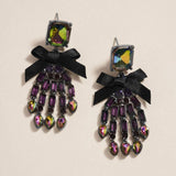 Bow Accent Glass Stone Skeleton Hand Dangle Earrings - Madeline Love - Flyclothing LLC