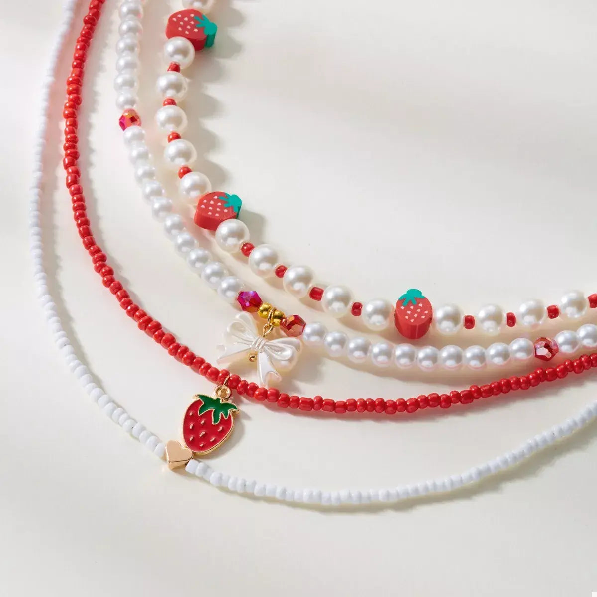 4 Piece Strawberry Pearl Beaded Necklace - Trendsi - Flyclothing LLC