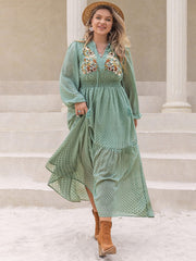Plus Size Tassel Printed Tie Neck Long Sleeve Midi Dress - Trendsi