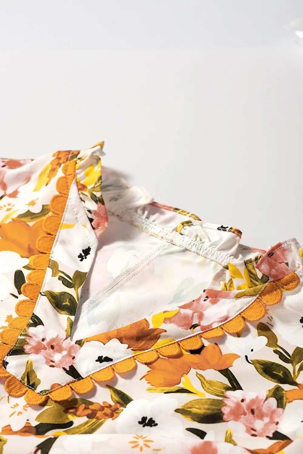 Ruffled Notched Short Sleeve Floral Blouse - Trendsi - Flyclothing LLC