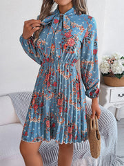 Pleated Printed Tie Neck Long Sleeve Dress - Trendsi