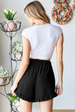 Heimish Full Size Ribbed Ruffle Hem Shorts - Trendsi