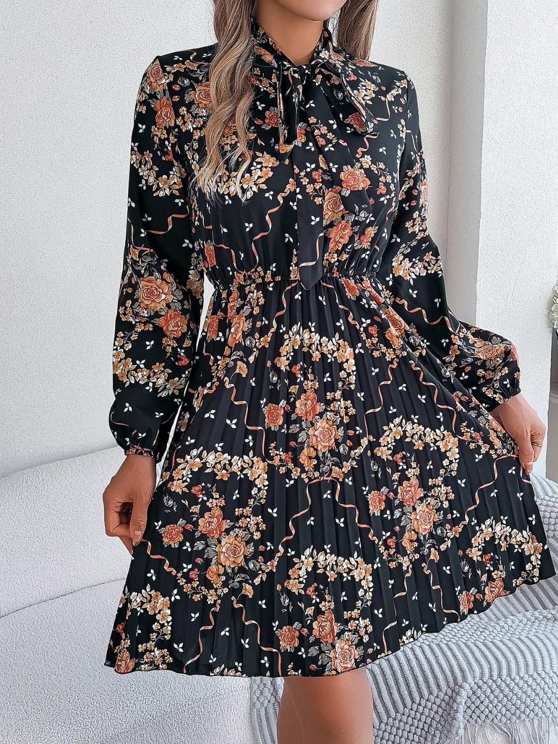 Pleated Printed Tie Neck Long Sleeve Dress - Trendsi