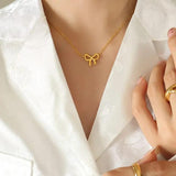 Titanium Steel Bow Pendant Necklace - Trendsi