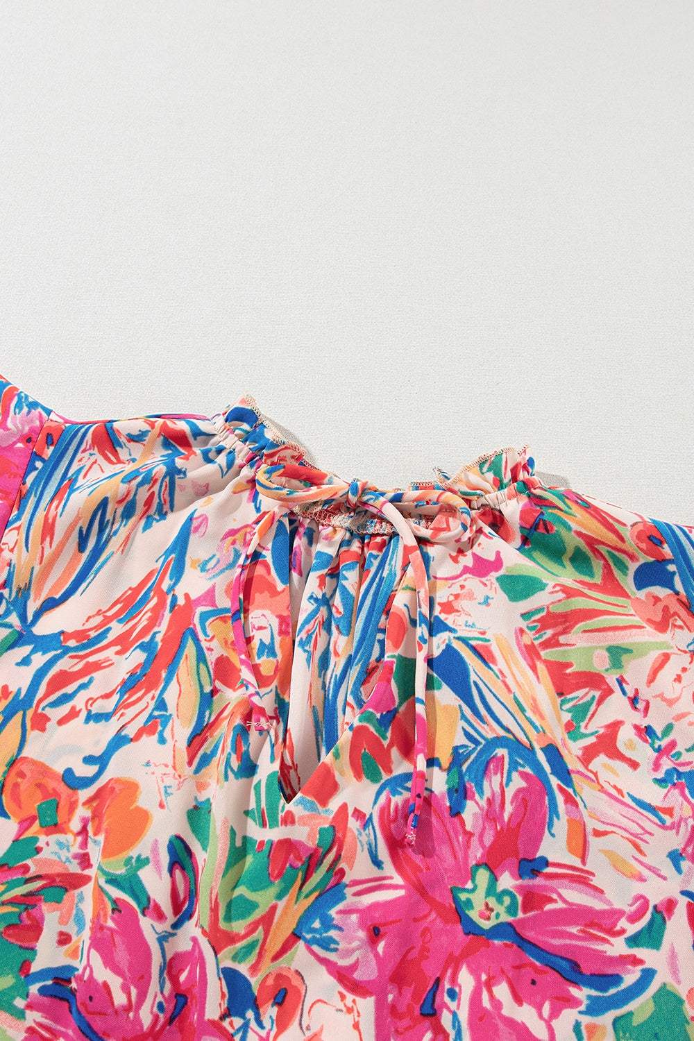 Ruffled Printed Tie Neck Cap Sleeve Blouse - Trendsi - Flyclothing LLC