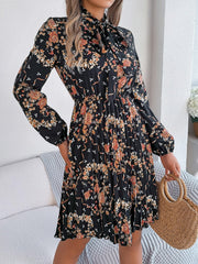 Pleated Printed Tie Neck Long Sleeve Dress - Trendsi