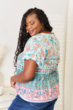 Perfee Floral Tie Neck Short Sleeve Blouse - Trendsi