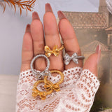 Twisted Titanium Steel Bow Ring - Trendsi - Flyclothing LLC