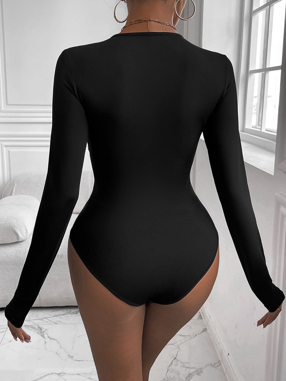 Perfee Twisted Round Neck Long Sleeve Bodysuit - Trendsi