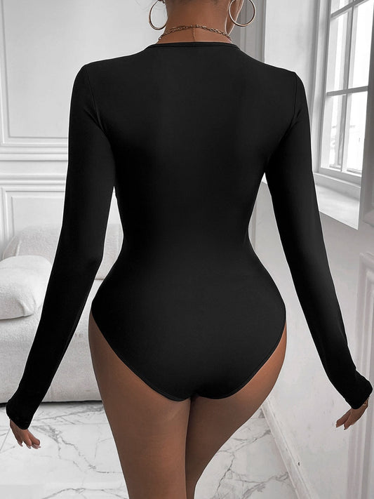 Perfee Twisted Round Neck Long Sleeve Bodysuit - Trendsi