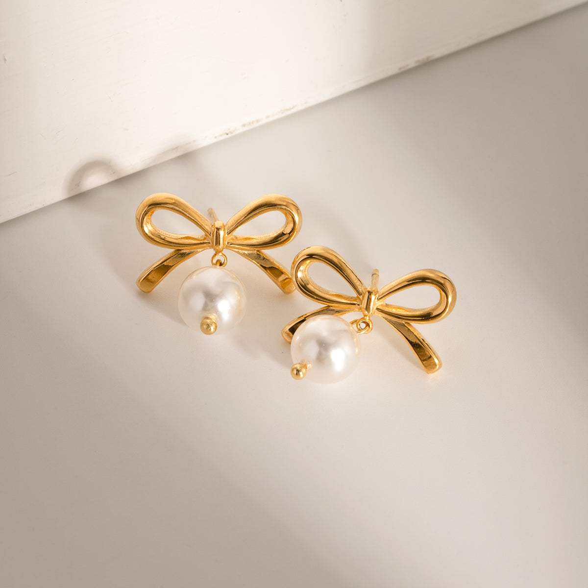 Stainless Steel Bow Pearl Earrings - Trendsi - Flyclothing LLC