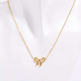 Titanium Steel Bow Pendant Necklace - Trendsi - Flyclothing LLC