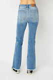 Judy Blue Full Size Distressed Raw Hem Bootcut Jeans - Trendsi