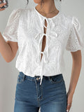 Perfee Tied Eyelet Short Sleeve Bodysuit - Trendsi