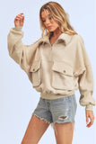 Aemi + Co Exposed Seam Half Zip Sweatshirt with Pockets - Trendsi