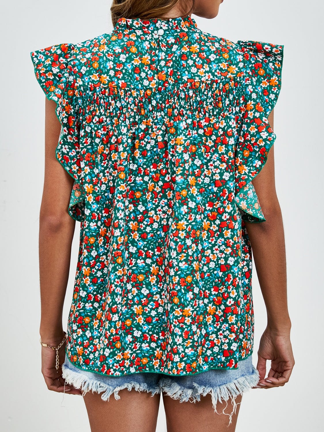 Ruffled Ditsy Floral Mock Neck Cap Sleeve Blouse - Trendsi