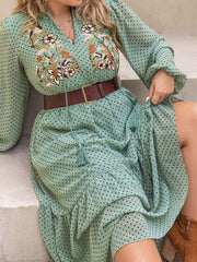 Plus Size Tassel Printed Tie Neck Long Sleeve Midi Dress - Trendsi