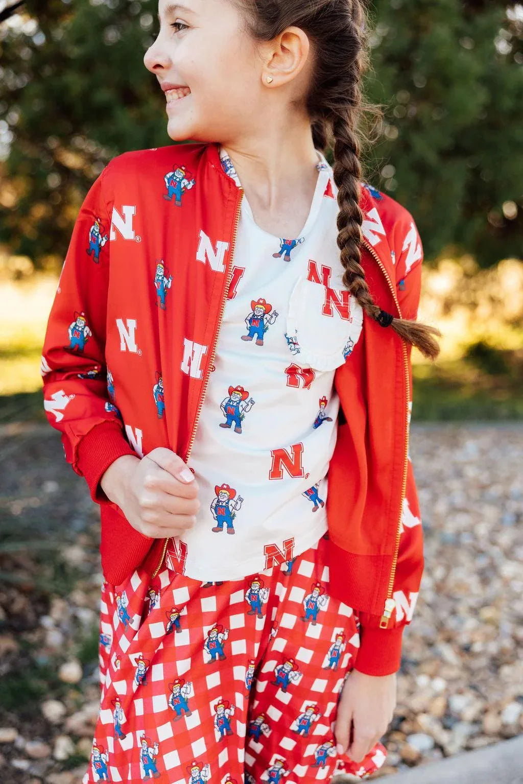 Nebraska White Herbie Husker Ruffle Pocket Tee - Mila & Rose ® - Flyclothing LLC