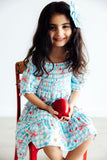 Honor Roll Smocked Ruffle Dress