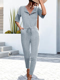 Buttoned Half Sleeve Round Neck Jumpsuit - Trendsi
