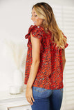 Double Take Floral Flutter Sleeve Notched Neck Blouse - Trendsi - Flyclothing LLC