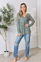 Heimish Full Size Floral Half Button Long Sleeve Blouse - Trendsi