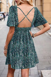 Printed Smocked Crisscross V-Neck Mini Dress - Trendsi
