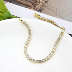 Alamode Gold Brass Bracelet with AAA Grade CZ in Clear - Alamode