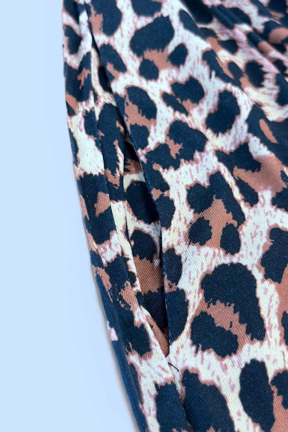 Double Take Printed Scoop Neck Sleeveless Buttoned Magic Dress with Pockets - Trendsi - Flyclothing LLC