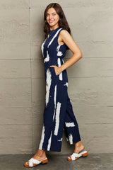 Printed Round Neck Cutout Jumpsuit with Pockets - Trendsi - Flyclothing LLC