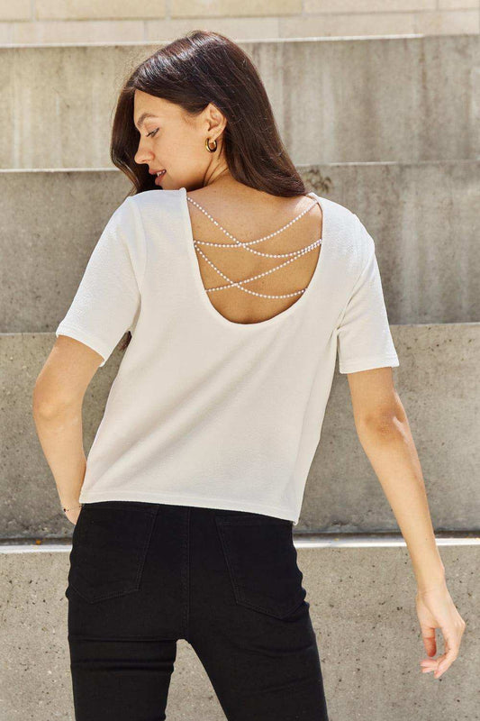 And The Why Pearly White Full Size Criss Cross Pearl Detail Open Back T-Shirt - Trendsi - Flyclothing LLC