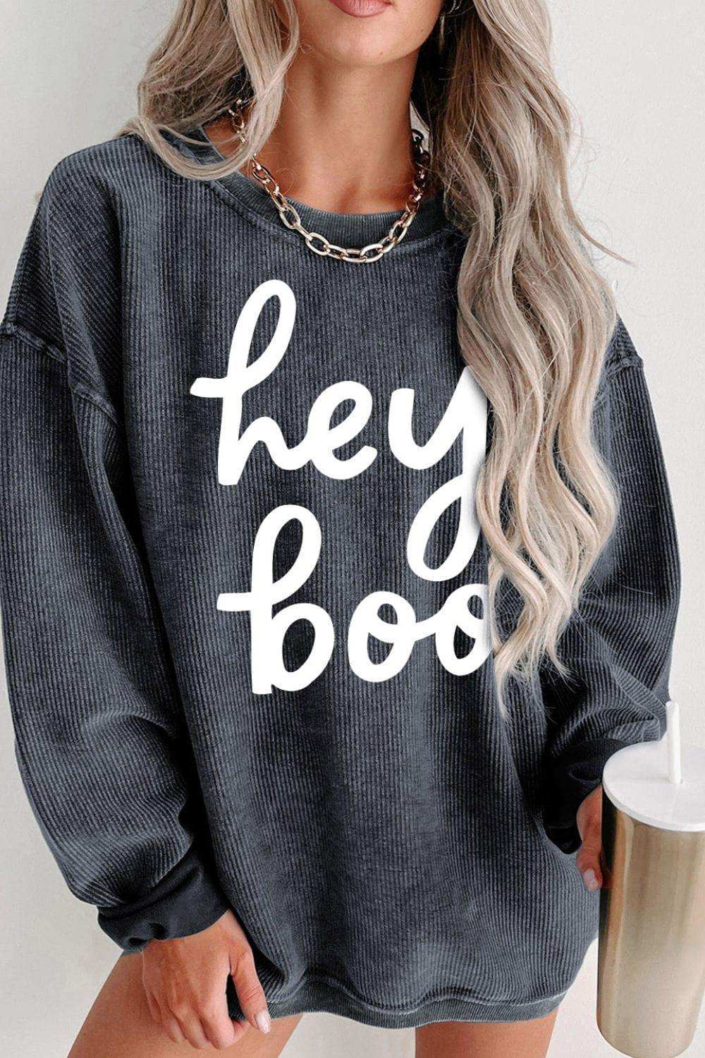 Round Neck Dropped Shoulder Graphic Sweatshirt - Trendsi