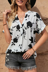 Floral Notched Neck Cuffed Short Sleeve Blouse - Flyclothing LLC
