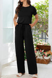 Round Neck Open Back Jumpsuit with Pockets - Trendsi