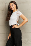 Spliced Lace Tied Open Back Bodysuit - Trendsi