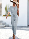 Buttoned Half Sleeve Round Neck Jumpsuit - Trendsi