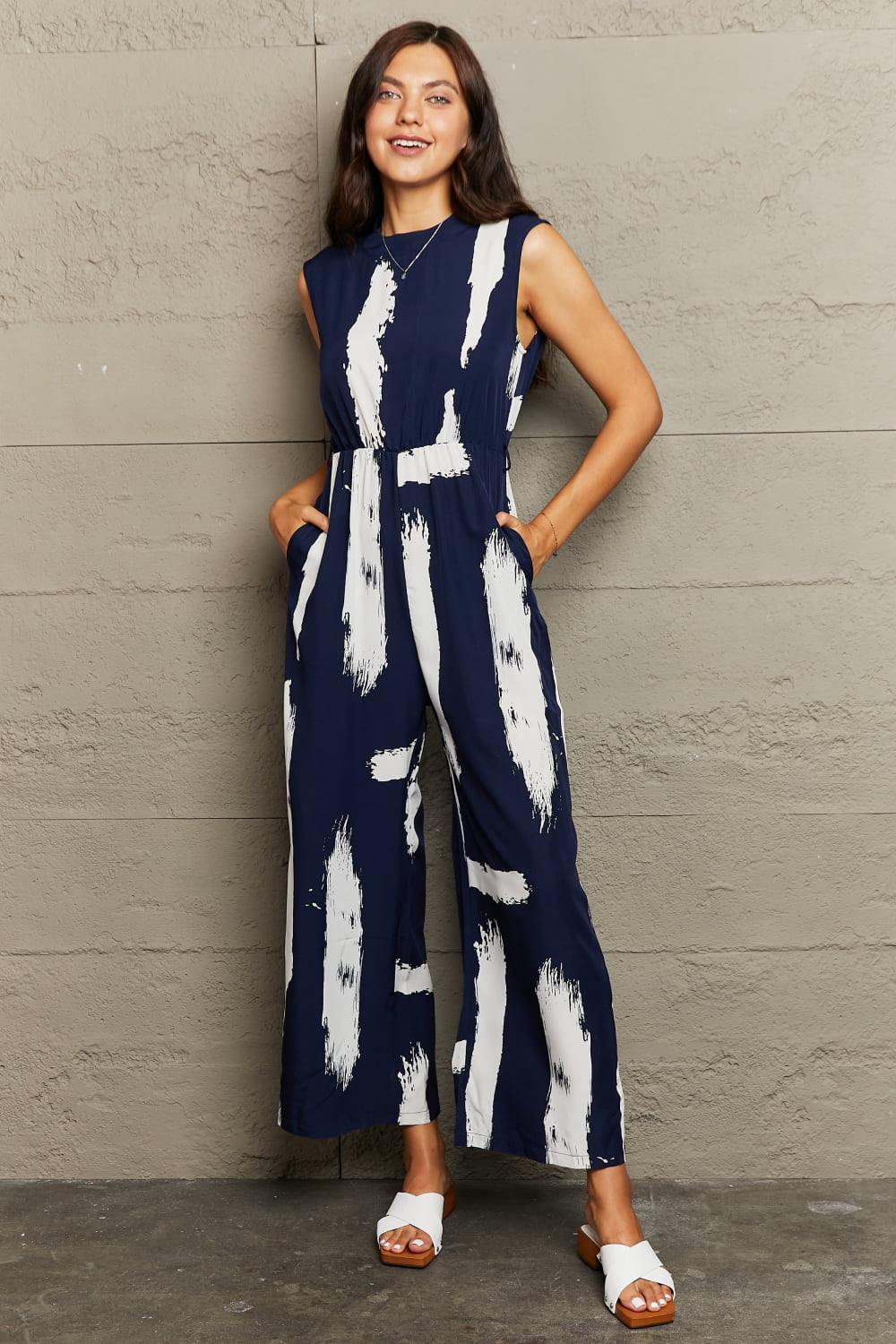 Printed Round Neck Cutout Jumpsuit with Pockets - Trendsi