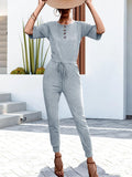 Buttoned Half Sleeve Round Neck Jumpsuit - Trendsi